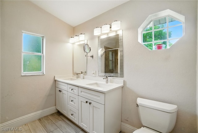 2711 4th St NW, Naples, FL 34120 - bathroom featuring double vanity and an enclosed shower
