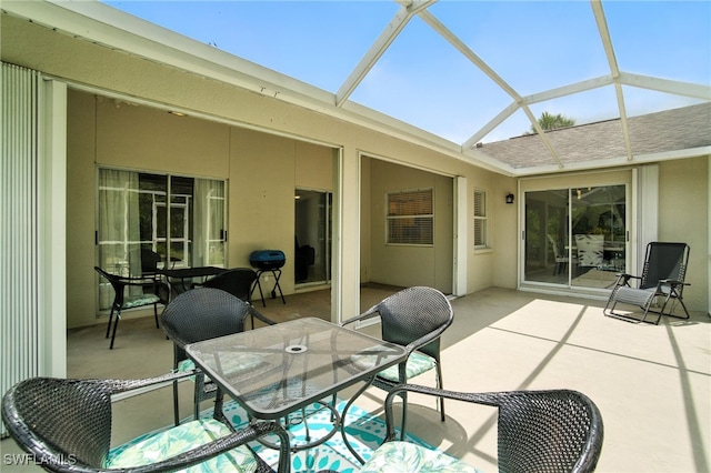 2711 4th St NW, Naples, FL 34120 - sunroom / solarium featuring outdoor dining area