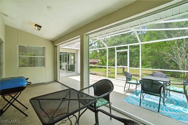 2711 4th St NW, Naples, FL 34120 - sunroom / solarium featuring lofted ceiling