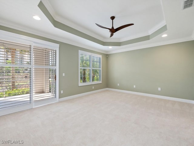 26690 Egrets Landing Dr Unit 101, Bonita Springs, FL 34134 - spare room featuring a raised ceiling, ornamental molding, light carpet, ceiling fan, and recessed lighting
