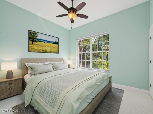 26690 Egrets Landing Dr Unit 101, Bonita Springs, FL 34134 - carpeted bedroom featuring baseboards and ceiling fan
