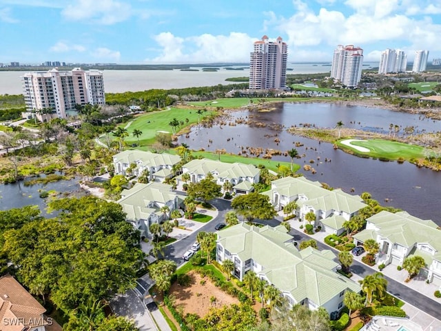 26690 Egrets Landing Dr Unit 101, Bonita Springs, FL 34134 - drone / aerial view of a large body of water and a golf course