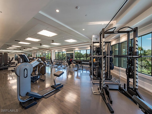 26690 Egrets Landing Dr Unit 101, Bonita Springs, FL 34134 - workout area with healthy amount of natural light and wood finished floors
