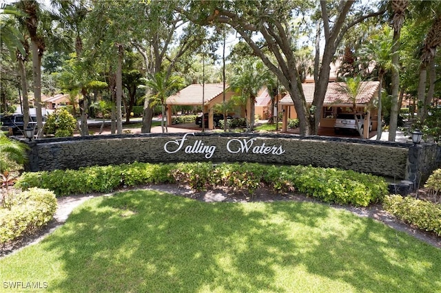 2396 Hidden Lake Dr Unit 3, Naples, FL 34112 - community sign featuring a lawn