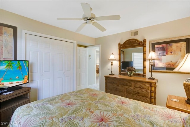 2396 Hidden Lake Dr Unit 3, Naples, FL 34112 - bedroom featuring a closet and a ceiling fan