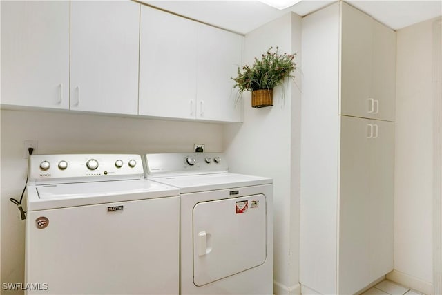 2396 Hidden Lake Dr Unit 3, Naples, FL 34112 - washroom featuring washing machine and dryer and cabinet space
