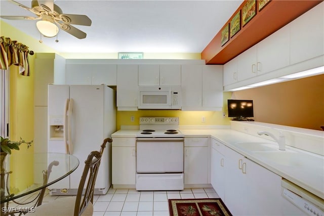 2396 Hidden Lake Dr Unit 3, Naples, FL 34112 - kitchen featuring white appliances, a ceiling fan, light countertops, and white cabinetry