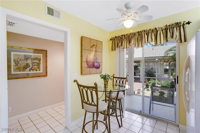 2396 Hidden Lake Dr Unit 3, Naples, FL 34112 - dining room with a ceiling fan and light tile patterned floors