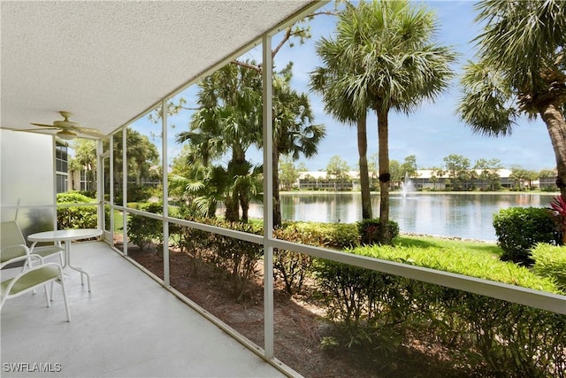 2396 Hidden Lake Dr Unit 3, Naples, FL 34112 - unfurnished sunroom with a water view and ceiling fan