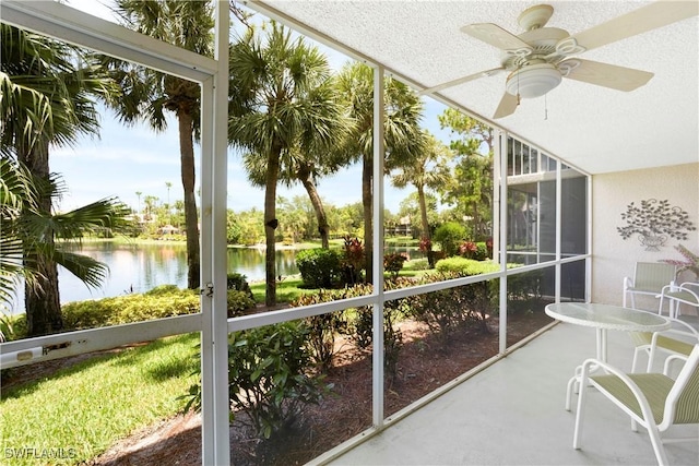 2396 Hidden Lake Dr Unit 3, Naples, FL 34112 - sunroom with a water view, ceiling fan, and healthy amount of natural light