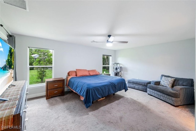 3457 NE 18th Pl, Cape Coral, FL 33909 - carpeted bedroom with a ceiling fan
