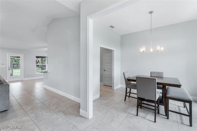3457 NE 18th Pl, Cape Coral, FL 33909 - dining area featuring a chandelier and light tile patterned flooring