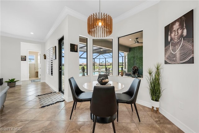 3910 Glacier Ct, Naples, FL 34119 - tiled dining area with crown molding, healthy amount of natural light, and recessed lighting