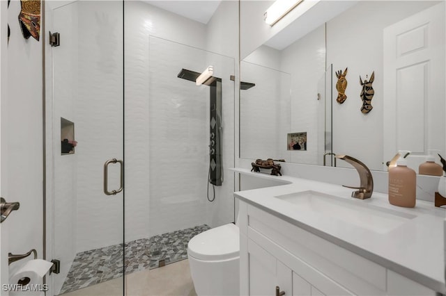 3910 Glacier Ct, Naples, FL 34119 - bathroom with vanity, a shower stall, and tile patterned flooring