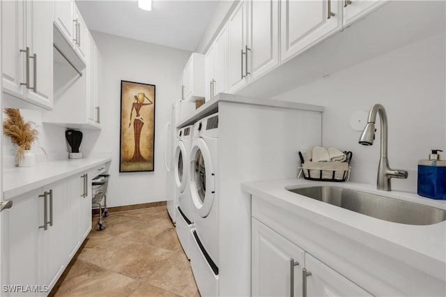 3910 Glacier Ct, Naples, FL 34119 - laundry room with washing machine and clothes dryer and cabinet space