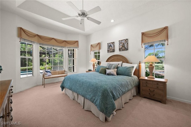 24881 Pennyroyal Dr, Bonita Springs, FL 34134 - bedroom with light carpet, multiple windows, ceiling fan, and recessed lighting