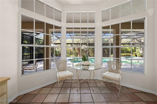 24881 Pennyroyal Dr, Bonita Springs, FL 34134 - sunroom with healthy amount of natural light and a pool