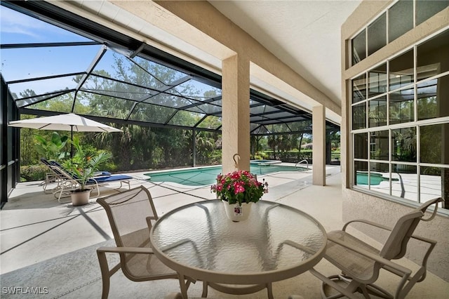 24881 Pennyroyal Dr, Bonita Springs, FL 34134 - view of swimming pool featuring a patio area, a pool with connected hot tub, and a lanai