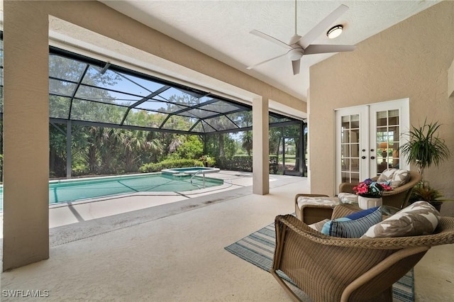 24881 Pennyroyal Dr, Bonita Springs, FL 34134 - view of pool featuring french doors, a patio area, ceiling fan, a pool with connected hot tub, and a lanai