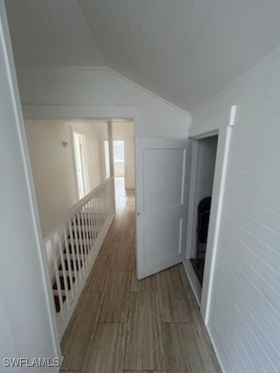 539 E Pasadena Ave, Clewiston, FL 33440 - corridor featuring vaulted ceiling and wood finish floors