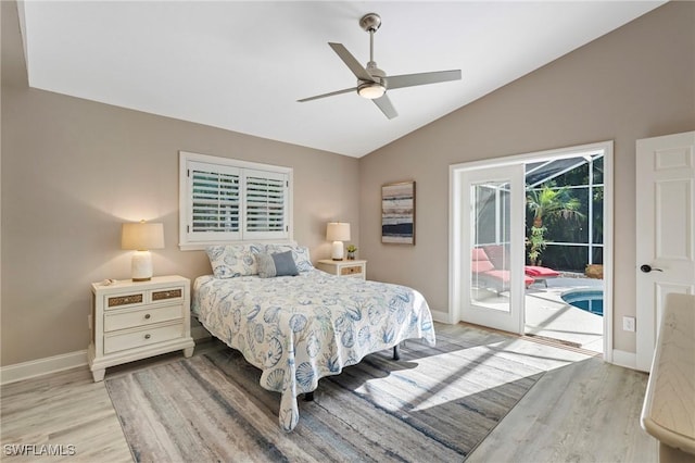 2548 River Reach Dr, Naples, FL 34104 - bedroom with wood finished floors, access to outside, vaulted ceiling, and ceiling fan