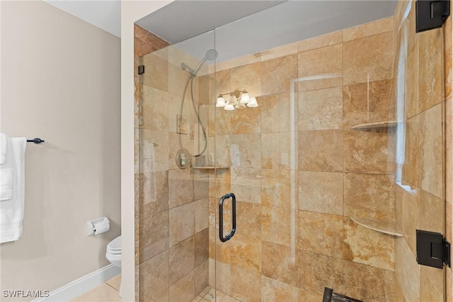 2548 River Reach Dr, Naples, FL 34104 - bathroom featuring a stall shower and toilet