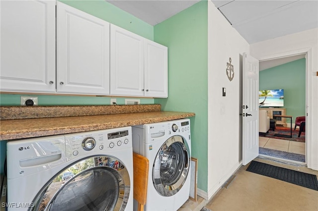 2548 River Reach Dr, Naples, FL 34104 - laundry room featuring separate washer and dryer and cabinet space