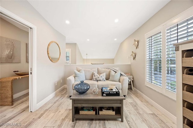 2450 Old Groves Rd Unit 201, Naples, FL 34109 - living room featuring healthy amount of natural light, wood finished floors, and recessed lighting