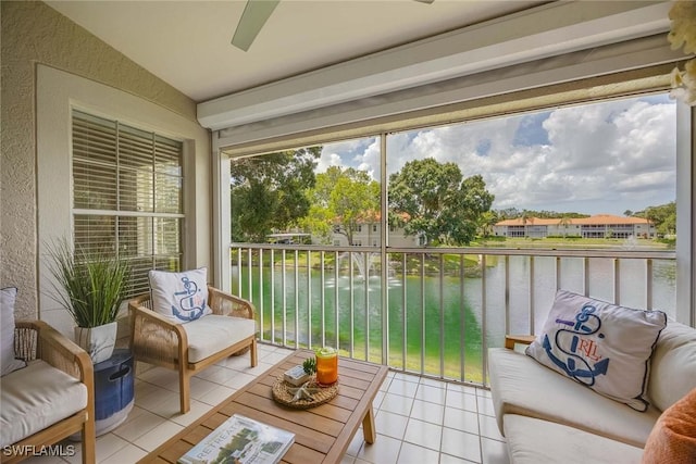 2450 Old Groves Rd Unit 201, Naples, FL 34109 - sunroom / solarium with a water view
