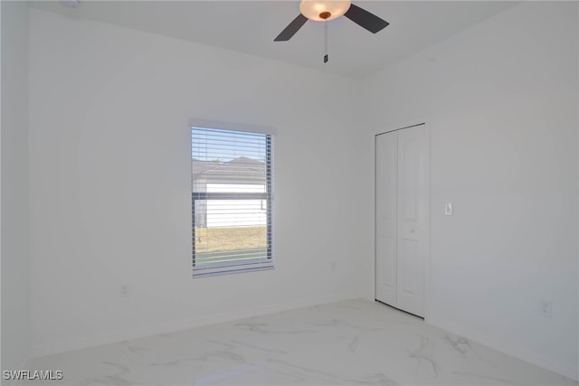 2107 Jefferson Ave, Alva, FL 33920 - spare room with light marble finish floors and ceiling fan