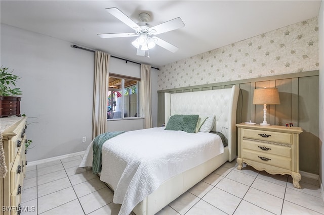 5421/5423 Centennial Blvd, Lehigh Acres, FL 33971 - bedroom featuring light tile patterned floors, wallpapered walls, and ceiling fan