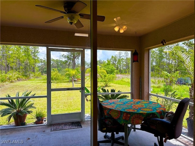 2675 70th Ave NE, Naples, FL 34120 - sunroom with view of wooded area
