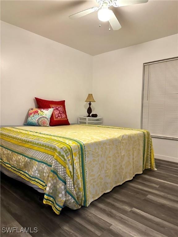 2675 70th Ave NE, Naples, FL 34120 - bedroom with wood finished floors and a ceiling fan