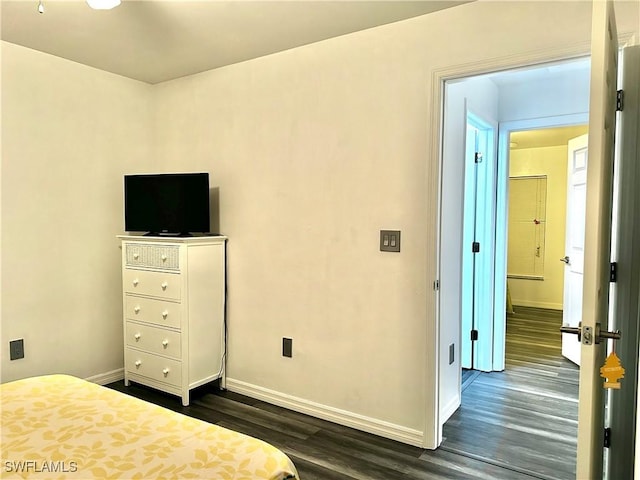 2675 70th Ave NE, Naples, FL 34120 - bedroom featuring dark wood finished floors and baseboards