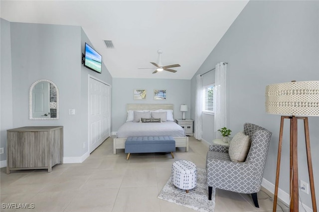4404 SW 5th Ave, Cape Coral, FL 33914 - bedroom featuring vaulted ceiling, light tile patterned floors, a closet, and ceiling fan