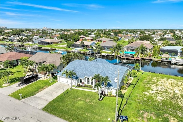 4404 SW 5th Ave, Cape Coral, FL 33914 - aerial perspective of suburban area featuring a nearby body of water