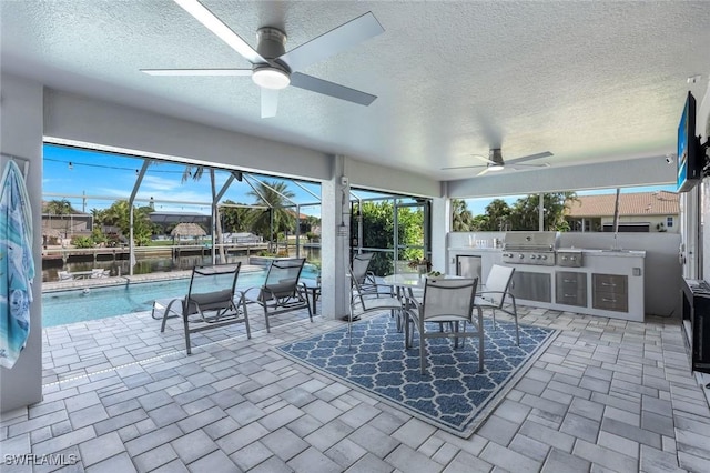 4404 SW 5th Ave, Cape Coral, FL 33914 - view of patio with a ceiling fan, area for grilling, an outdoor pool, and glass enclosure