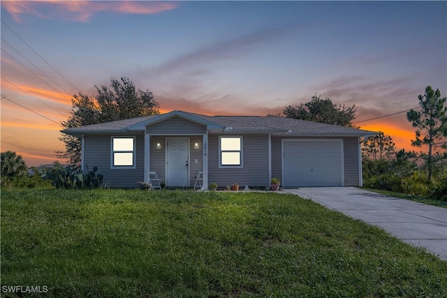 2818 66th St W, Lehigh Acres, FL 33971 - view of front of property with driveway, a yard, an attached garage, and roof with shingles