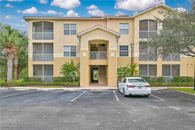 9015 Colby Dr Unit 2010, Fort Myers, FL 33919 - view of property with uncovered parking