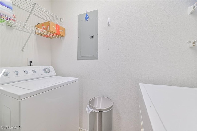 9015 Colby Dr Unit 2010, Fort Myers, FL 33919 - laundry area featuring washer / clothes dryer, electric panel, and a textured wall