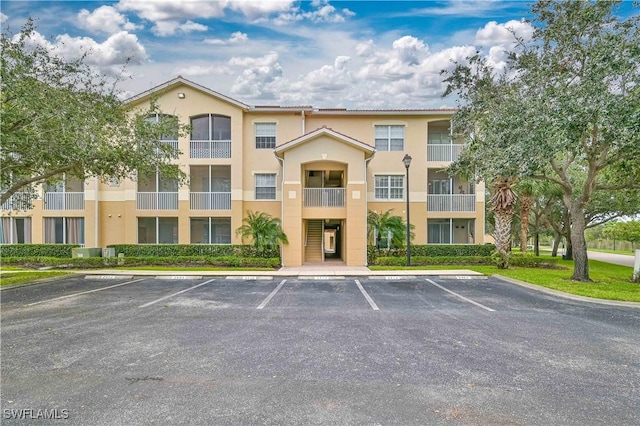 9015 Colby Dr Unit 2010, Fort Myers, FL 33919 - view of property with uncovered parking