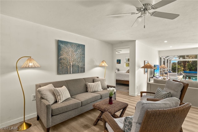 486 Lake Murex Cir, Sanibel, FL 33957 - living room featuring wood finished floors and a ceiling fan