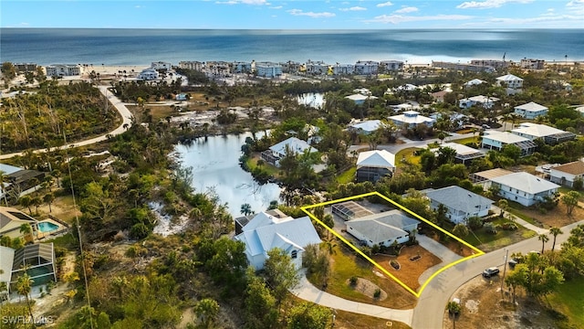 486 Lake Murex Cir, Sanibel, FL 33957 - aerial perspective of suburban area featuring property parcel outlined and a large body of water