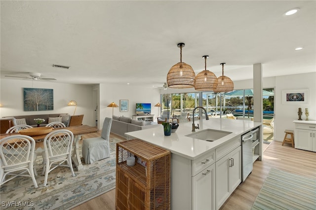 486 Lake Murex Cir, Sanibel, FL 33957 - kitchen with ceiling fan, open floor plan, light wood-type flooring, light countertops, and recessed lighting