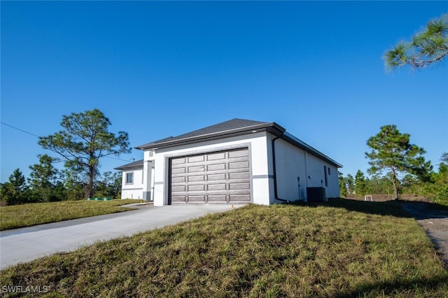 1268 Hillcrest St E, Lehigh Acres, FL 33974 - garage with driveway