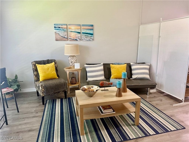 240 N Collier Blvd Unit A3, Marco Island, FL 34145 - sitting room featuring light wood-type flooring and baseboards