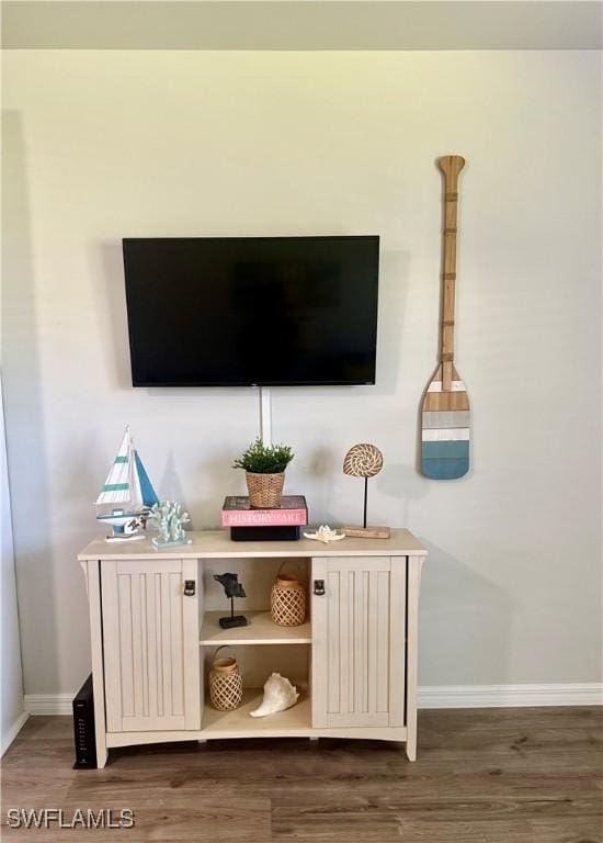 240 N Collier Blvd Unit A3, Marco Island, FL 34145 - detailed view of baseboards and wood finished floors