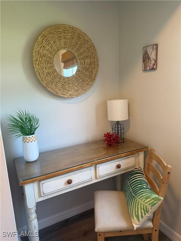 240 N Collier Blvd Unit A3, Marco Island, FL 34145 - detailed view of built in desk and wood finished floors