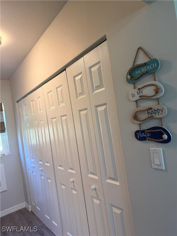 240 N Collier Blvd Unit A3, Marco Island, FL 34145 - detailed view of wood finished floors and baseboards