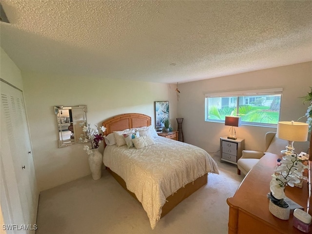 6300 S Pointe Blvd Unit 459, Fort Myers, FL 33919 - carpeted bedroom with a textured ceiling